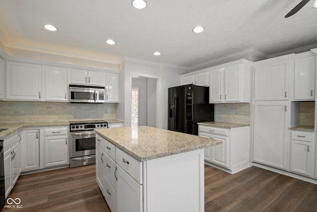 kitchen with black appliances, decorative backsplash, white cabinetry, and dark wood-type flooring