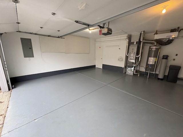 garage featuring gas water heater, electric panel, and a garage door opener