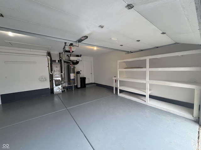 garage with heating unit, a garage door opener, and water heater