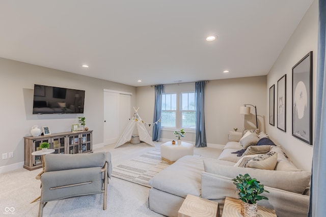 living room featuring light carpet