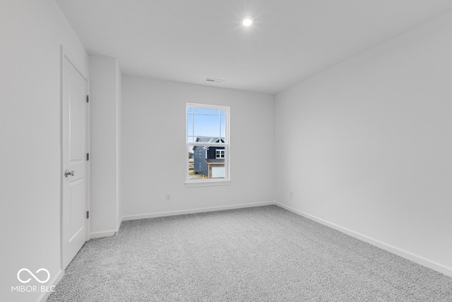 unfurnished bedroom featuring carpet flooring and baseboards