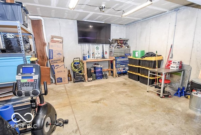 basement with a workshop area