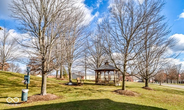 view of community with a gazebo and a lawn