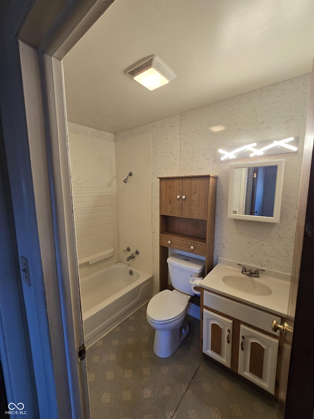 full bathroom with vanity,  shower combination, and toilet