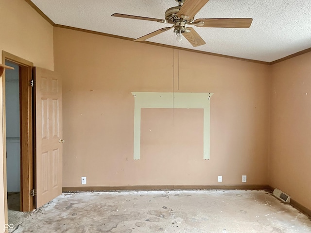 spare room with a textured ceiling, ceiling fan, and crown molding