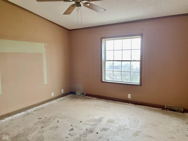 unfurnished room with a textured ceiling and ceiling fan