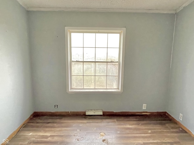4726 E 210 N, Lebanon, IN 46052 - spare room with wood finished floors and ornamental molding