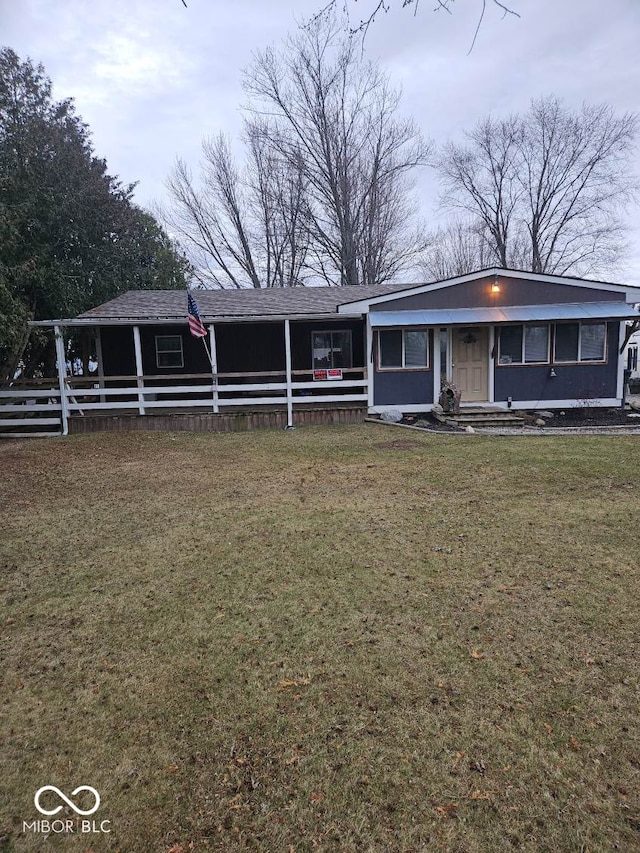 view of front of home with a front lawn