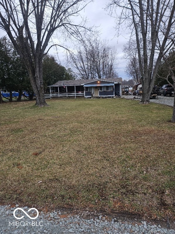 view of front of home with a front yard