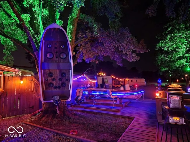 view of deck at twilight