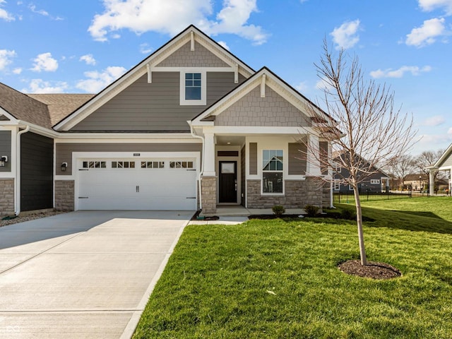 16689 Cattle Hollow Ln, Noblesville, IN 46060 - craftsman house with stone siding, driveway, a garage, and a front lawn