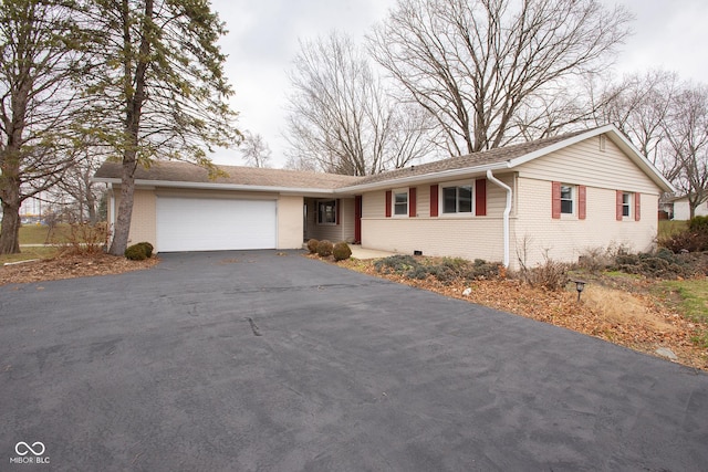 single story home with a garage