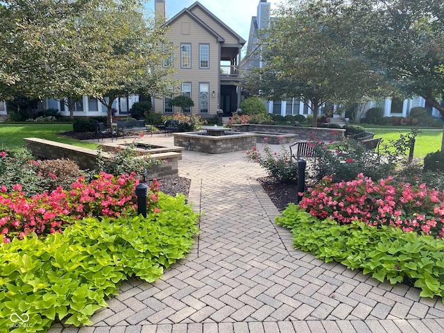 surrounding community featuring a patio area