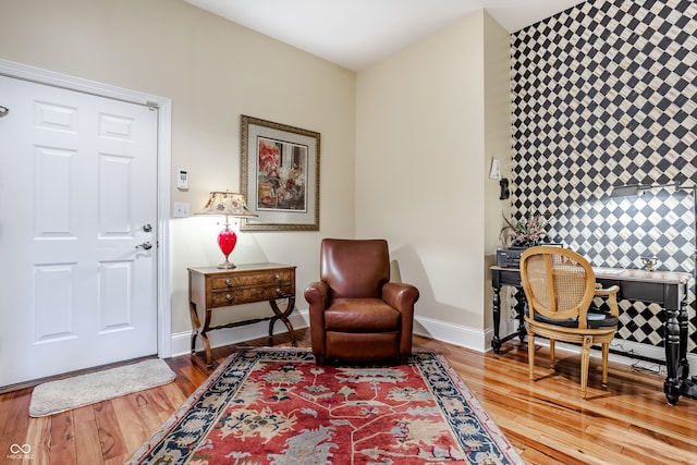 living area with wood-type flooring