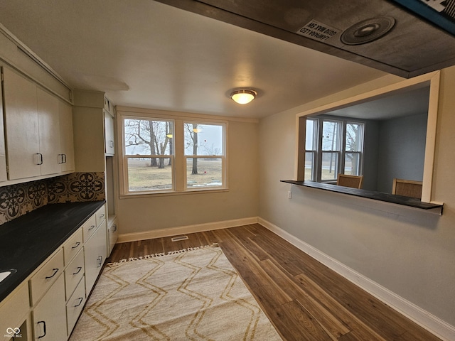 kitchen featuring dark hardwood / wood-style floors