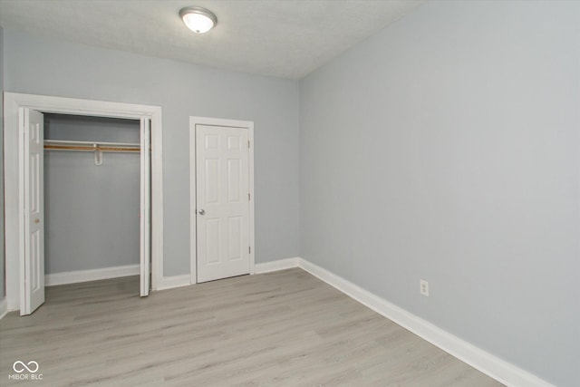 unfurnished bedroom featuring light hardwood / wood-style floors