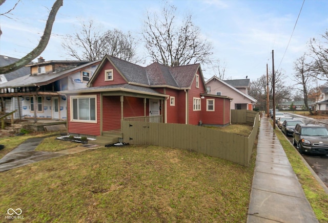 bungalow with a front yard