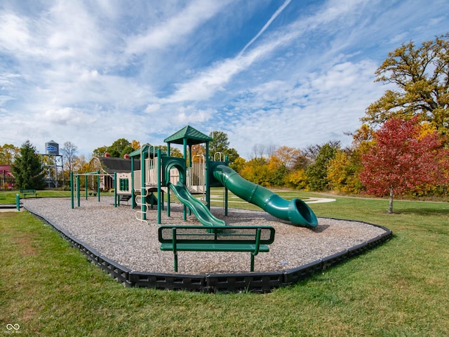 view of jungle gym with a lawn