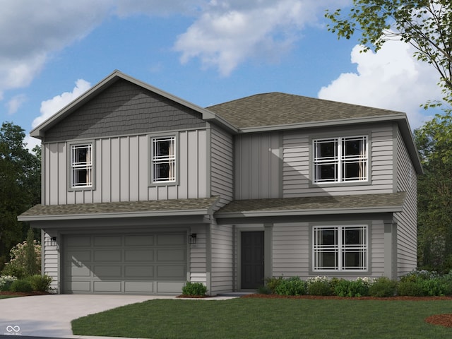 view of front of house featuring a garage and a front yard