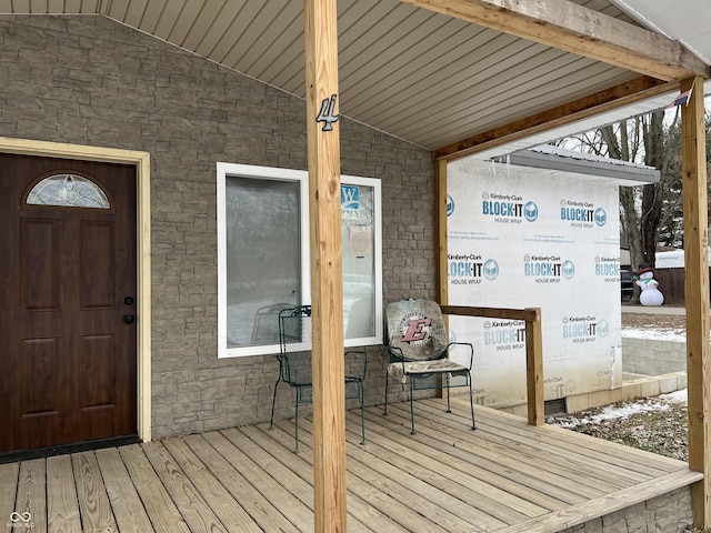 doorway to property featuring a deck