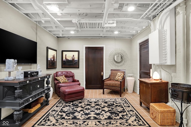 living room with tile patterned floors