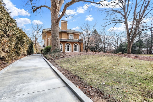 view of front of home with a front yard