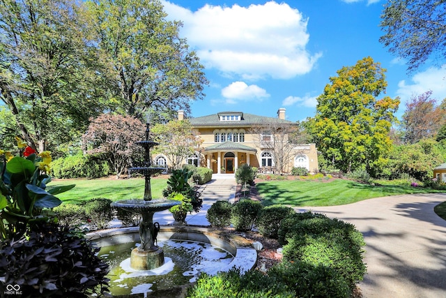 view of front of house with a front yard