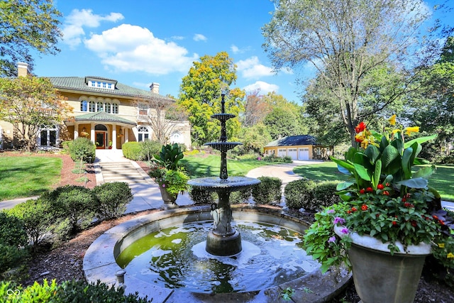 surrounding community with a yard and an outdoor structure