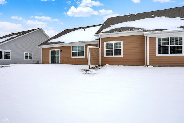 view of snow covered property