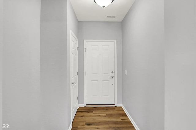 doorway to outside featuring hardwood / wood-style floors