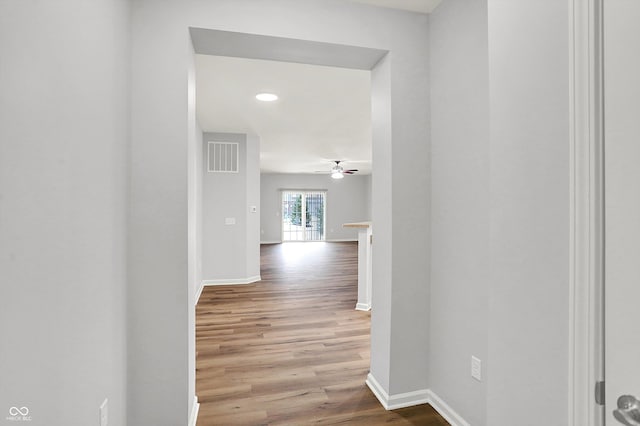 hall featuring light wood-type flooring