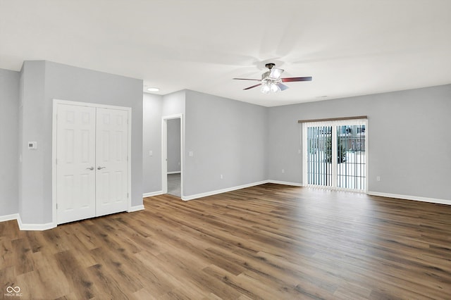 interior space featuring hardwood / wood-style flooring and ceiling fan