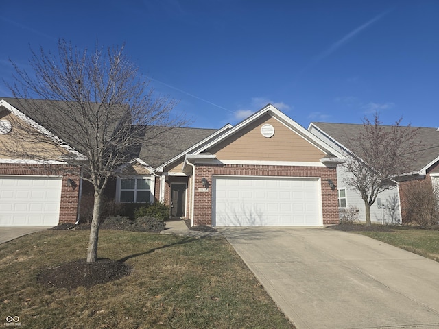 ranch-style home featuring a garage and a front lawn