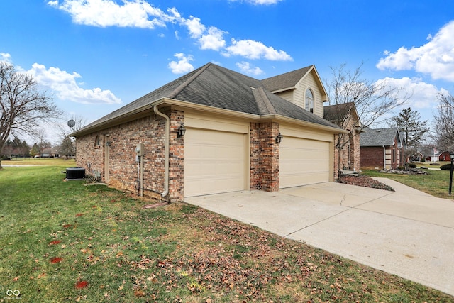 view of property exterior featuring a lawn, central AC, and a garage