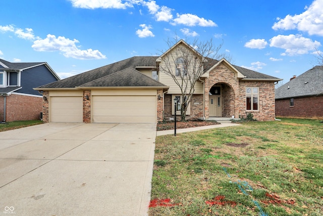 front of property with a front lawn and a garage