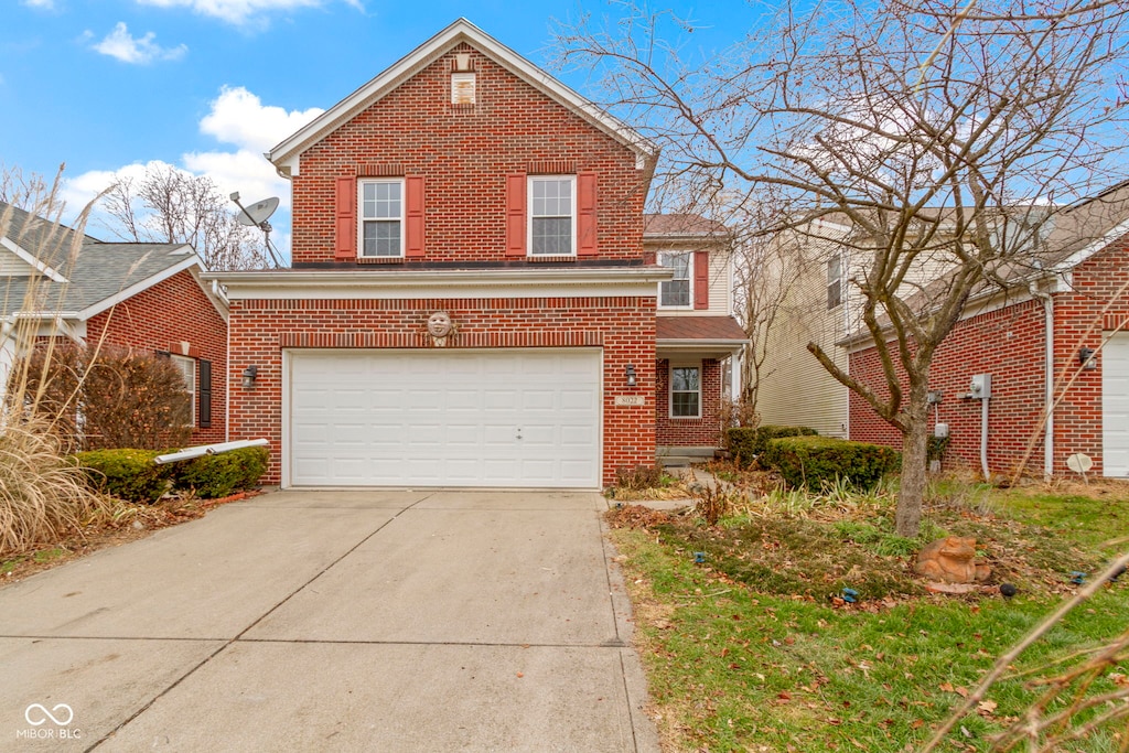 front of property with a garage