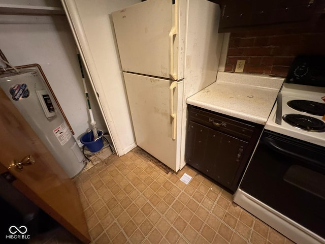 kitchen with white cabinets, white appliances, and water heater