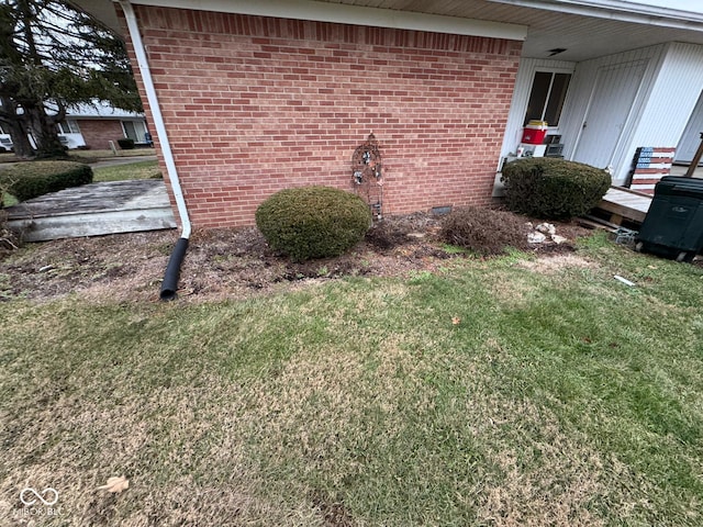 view of property exterior with a lawn