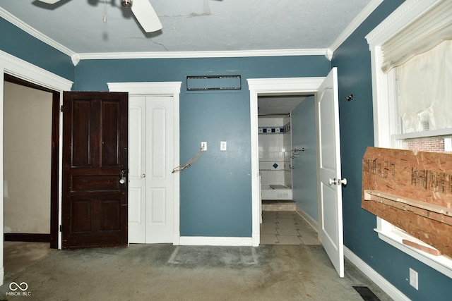 bedroom with ceiling fan and crown molding