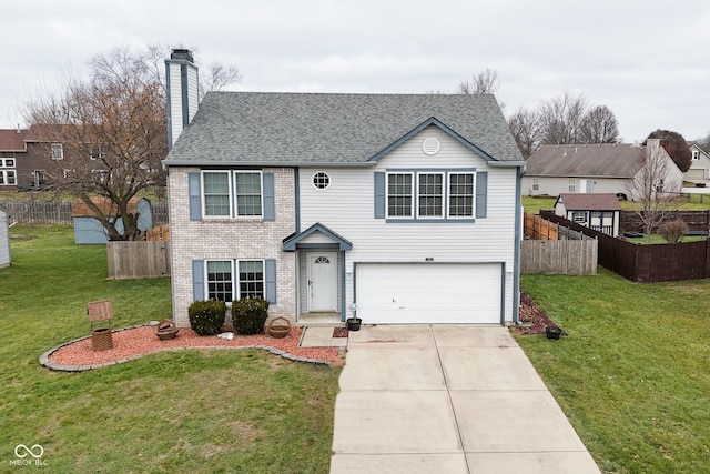 view of front of home with a garage and a front yard