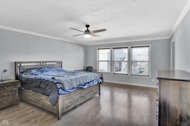 bedroom with hardwood / wood-style flooring, ceiling fan, ornamental molding, and a textured ceiling