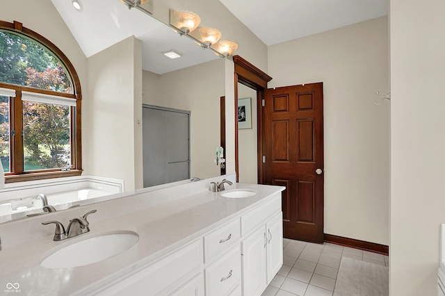 3592 W Smokey Row Rd, Bargersville, IN 46106 - bathroom with tile patterned floors, double vanity, and a bath