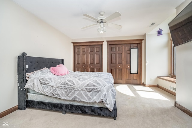 3592 W Smokey Row Rd, Bargersville, IN 46106 - bedroom with carpet floors, multiple closets, and a ceiling fan