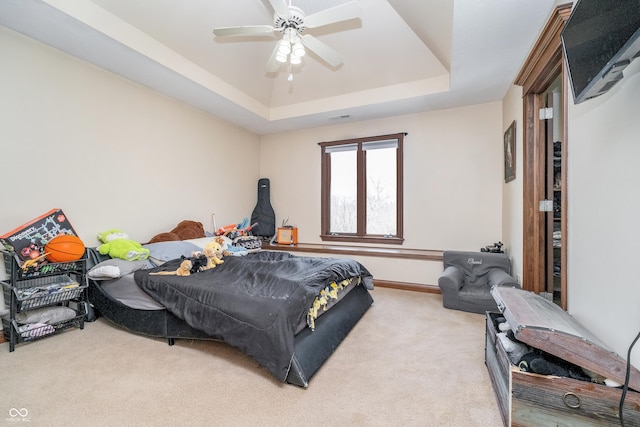 3592 W Smokey Row Rd, Bargersville, IN 46106 - carpeted bedroom featuring a tray ceiling and a ceiling fan