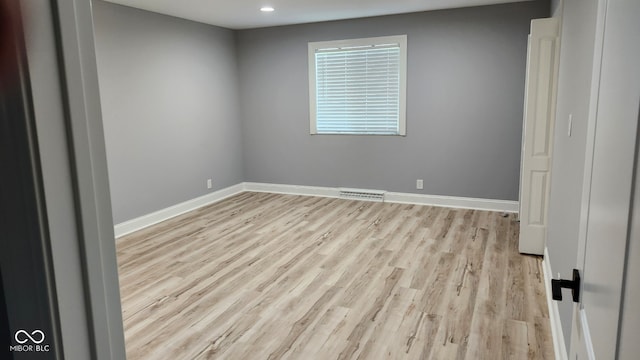 empty room featuring light hardwood / wood-style flooring