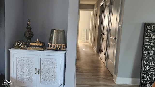 hall featuring hardwood / wood-style floors