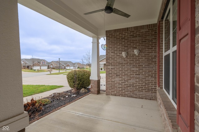 view of patio featuring a residential view and ceiling fan