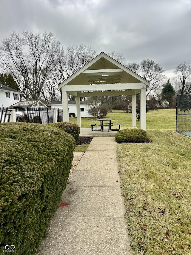 view of property's community featuring a gazebo and a lawn