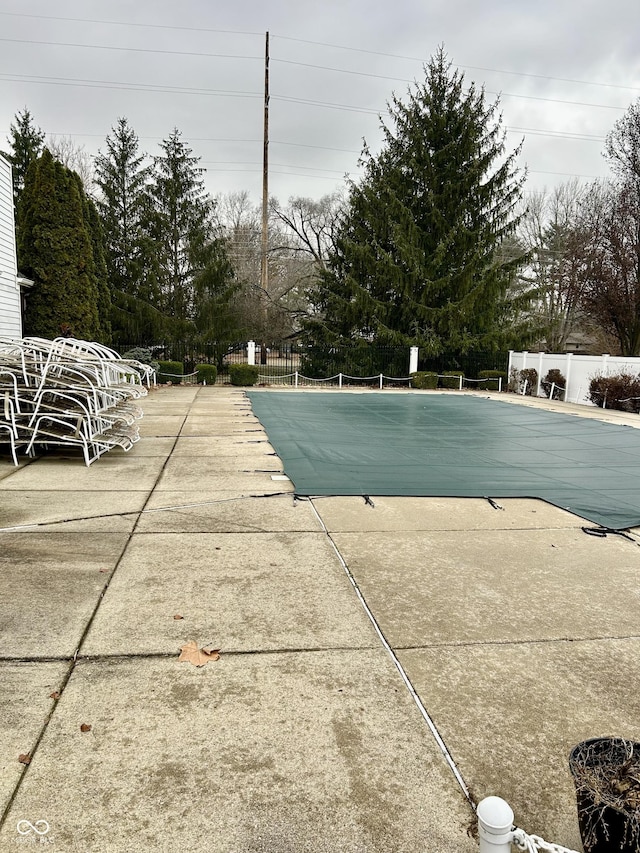 view of swimming pool featuring a patio area