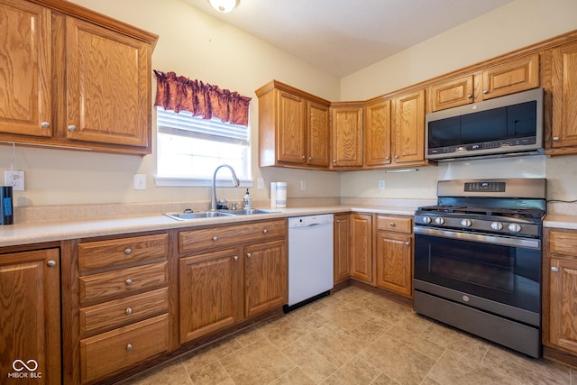 kitchen featuring stainless steel appliances and sink